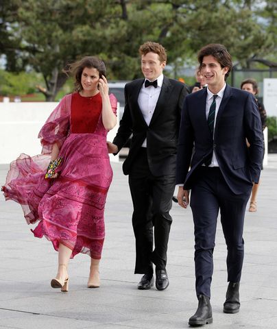 Tatiana Schlossberg, left, granddaughter of late U.S. President John F. Kennedy, her husband, George Moran, center, and Jack Schlossberg, right, grandson of the late President Kennedy, arrive at the John F. Kennedy Presidential Library and Museum before 2018 Profile in Courage award ceremony, Sunday, May 20, 2018, in Boston. Tatiana Schlossberg, left, her husband, George Moran, center, and Jack Schlossberg, right, in Boston on May 20, 2018.Credit: AP Photo/Steven Senne