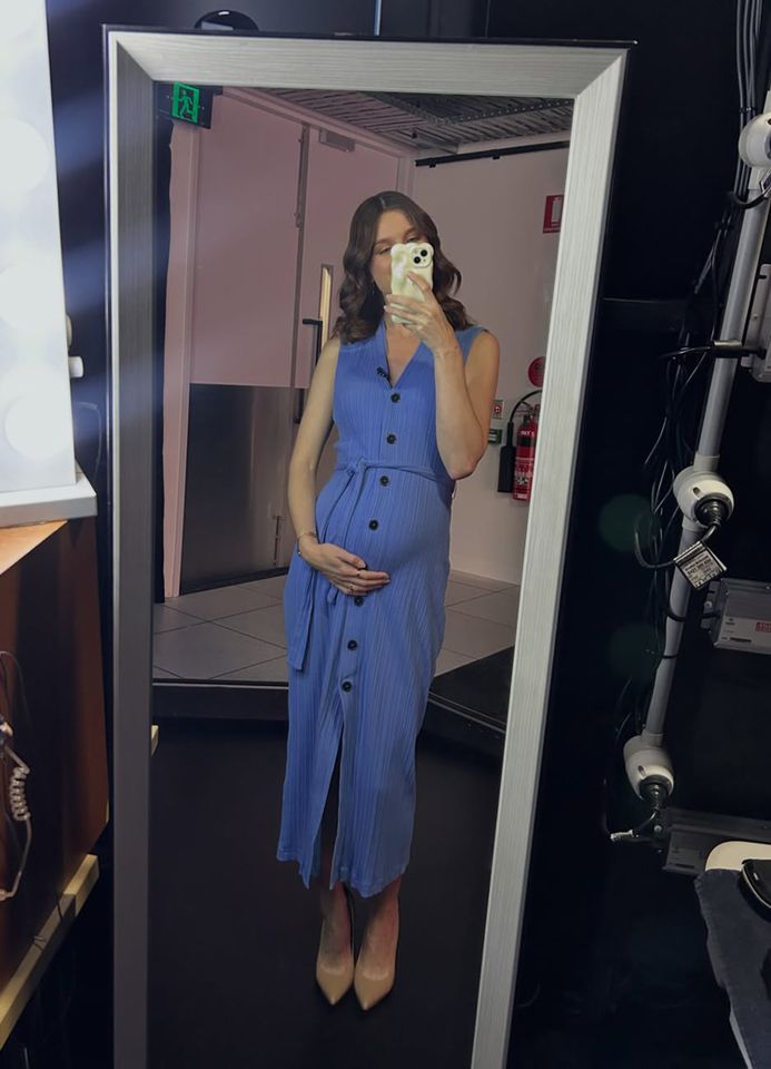 Bethan Yeoman TV News Reporter reveals she got fired while on maternity leave Bethan Yeoman cradling her baby bumpCredit: Bethan Yeoman/Instagram