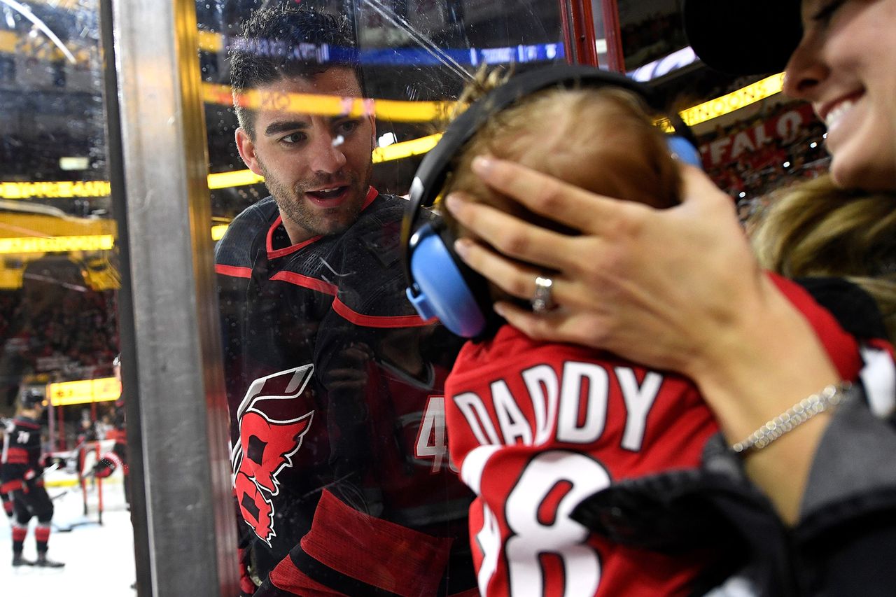 Jordan Martinook #48 of the Carolina Hurricanes greets his three-month-old son Chase during the 2019 NHL Stanley Cup Playoffs on April 15, 2019 in Raleigh, North Carolina. Jordan Martinook #48 of the Carolina Hurricanes greets his three-month-old son Chase during the 2019 NHL Stanley Cup Playoffs on April 15, 2019 in Raleigh, North Carolina.Credit: Grant Halverson/Getty