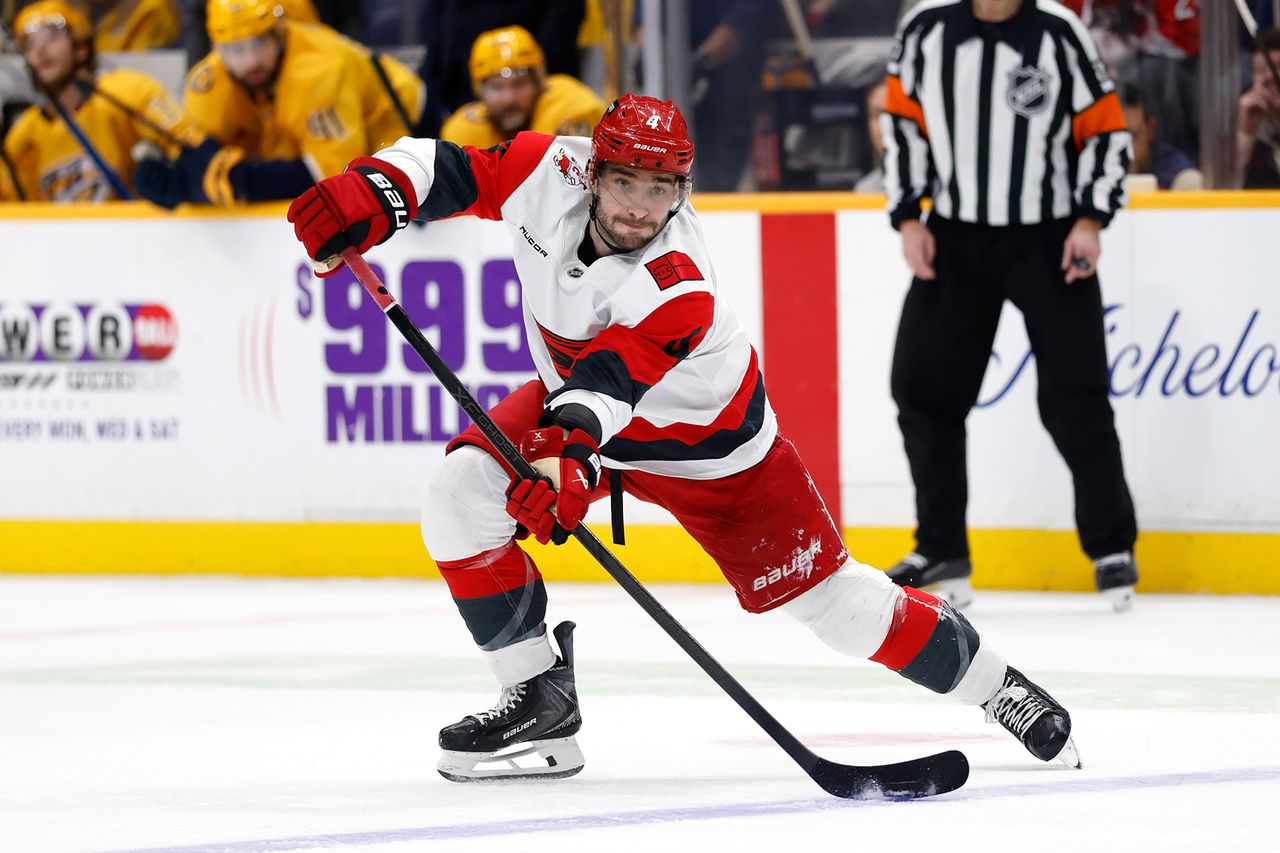 Shayne Gostisbehere #4 of the Carolina Hurricanes during a game on December 17, 2025 in Nashville, Tennessee. Shayne Gostisbehere #4 of the Carolina Hurricanes during a game on December 17, 2025 in Nashville, Tennessee.Credit: Johnnie Izquierdo/Getty
