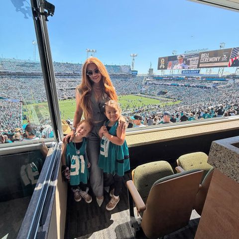 Dr. Mindy Armstead with her daughters cheer on their dad, Arik Armstead of the Jacksonville Jaguars, at a game.Credit: Mindy MS, MD/Instagram