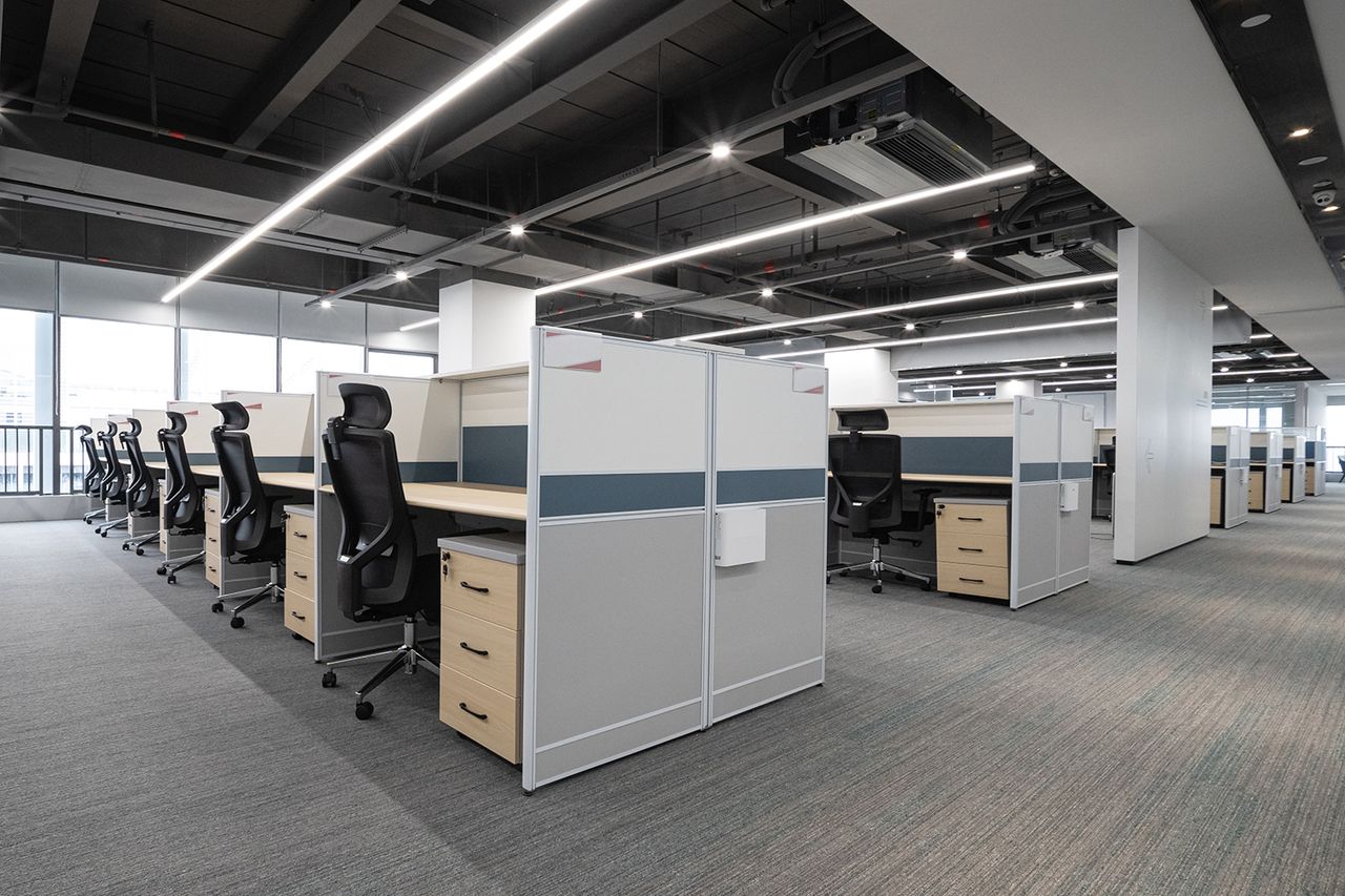 Stock image of empty office cubiclesCredit: Getty