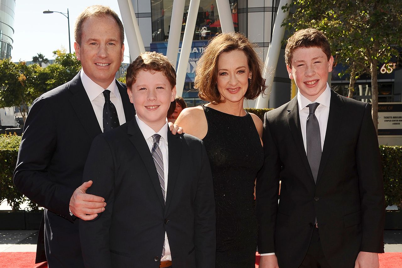 Joan Cusack, Richard Burke, and sons Miles Burke and Dylan Burke attend the 2013 Creative Arts Emmy Awards on Sept. 15, 2013, in Los Angeles.Credit: Jason LaVeris/FilmMagic