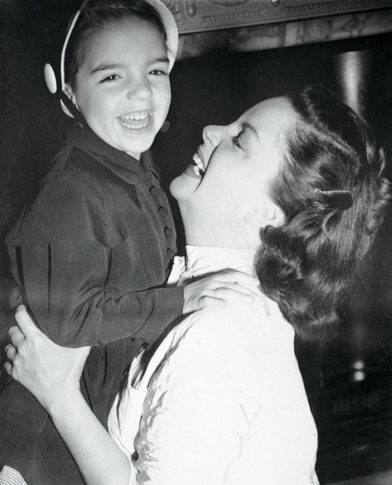 Judy Garland holding Liza MinnelliCredit: Bettmann Archive/Getty