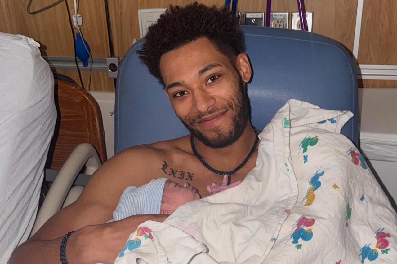 K'Andre Miller and his son Kashton. K'Andre Miller and his son Kashton.Credit: K'Andre Miller/Instagram