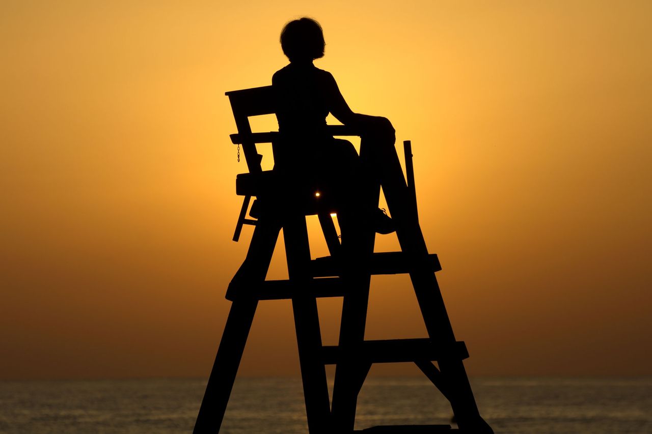 A stock image of a lifeguard observing beachgoersCredit: Getty