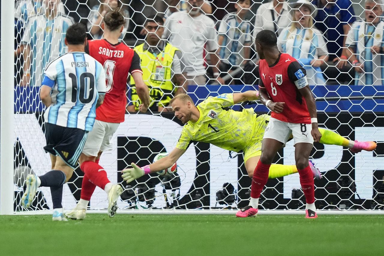 Lionel Messi (L) of Argentina scores the 1-0 goal against goalkeeper Alexander Schlager of Austria during the FIFA World Cup 2026 group stage match Argentina against Austria, in Dallas, USA, 22 June 2026.Credit: JEFFREY MCWHORTER/EPA/Shutterstock