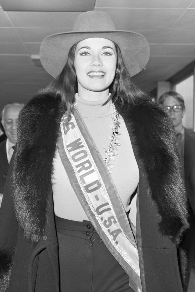 Lynda Carter is photographed wearing a cowboy hat at the London airport after winning Miss World USA in 1972Credit: Bettmann/Getty