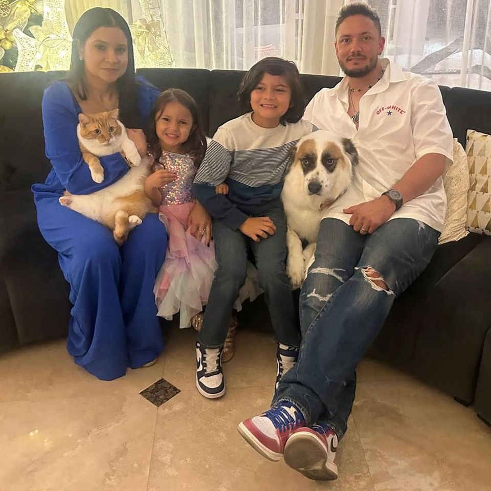 Miguel Rojas and his wife with their two kids and petsCredit: miggyslocker/Instagram