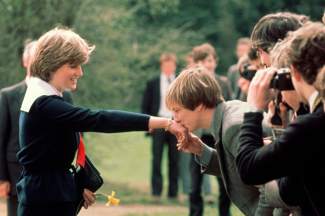 Schoolboy Nicholas Hardy kisses Lady Diana Spencer's hand after giving her a daffodil, during her visit to Cheltenham. Schoolboy Nicholas Hardy kisses Lady Diana Spencer's hand after giving her a daffodilCredit: Hulton-Deutsch Collection/CORBIS/Corbis via Getty