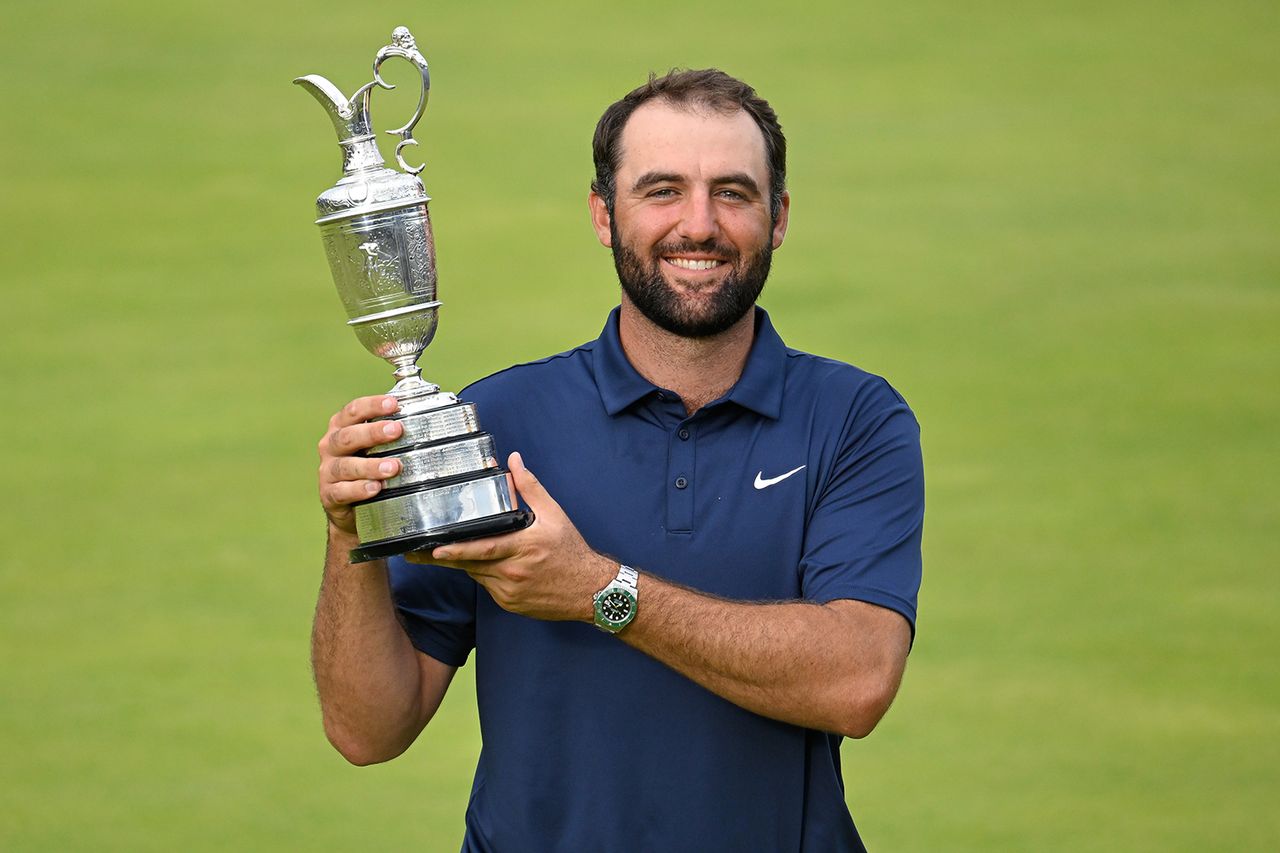 Scottie Scheffler of the United States holds The Claret Jug on the 18th green during the final round of The Open Championship at Royal Portrush Golf Club on July 20, 2025 in Portrush, Northern Ireland. Scottie Scheffler won The Open Championship last July.Credit: Ben Jared/PGA TOUR via Getty