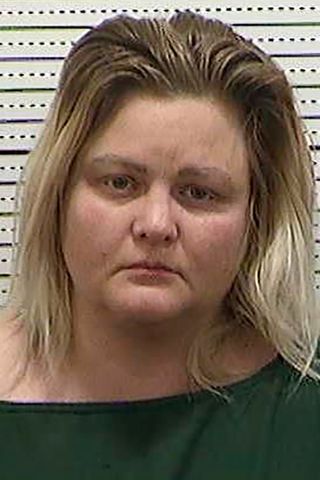 In this booking image released by the Ward County Detention Center, shows Nichole Rice, 34.Credit: Ward County Detention Center via AP
