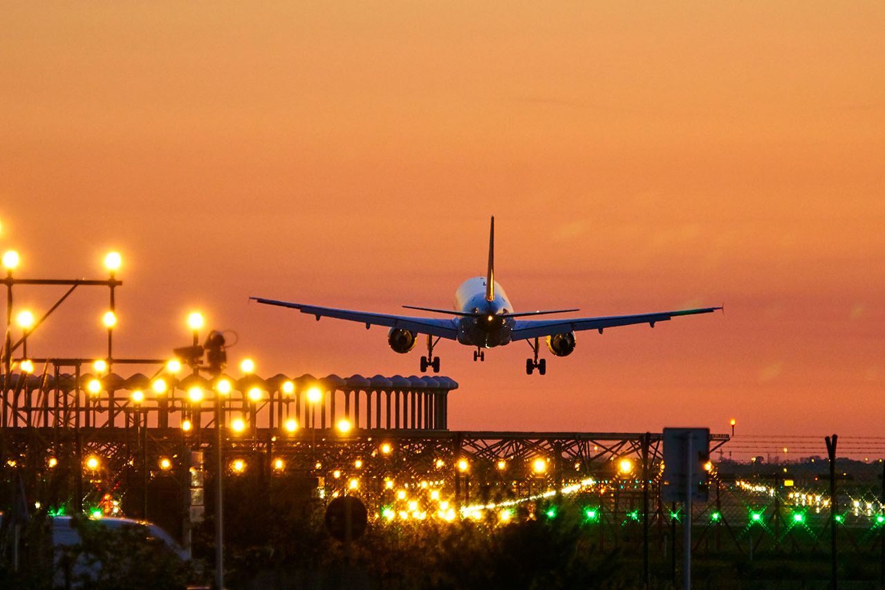 Airplane landing during sunset in Barcelona (stock image)Credit: Getty