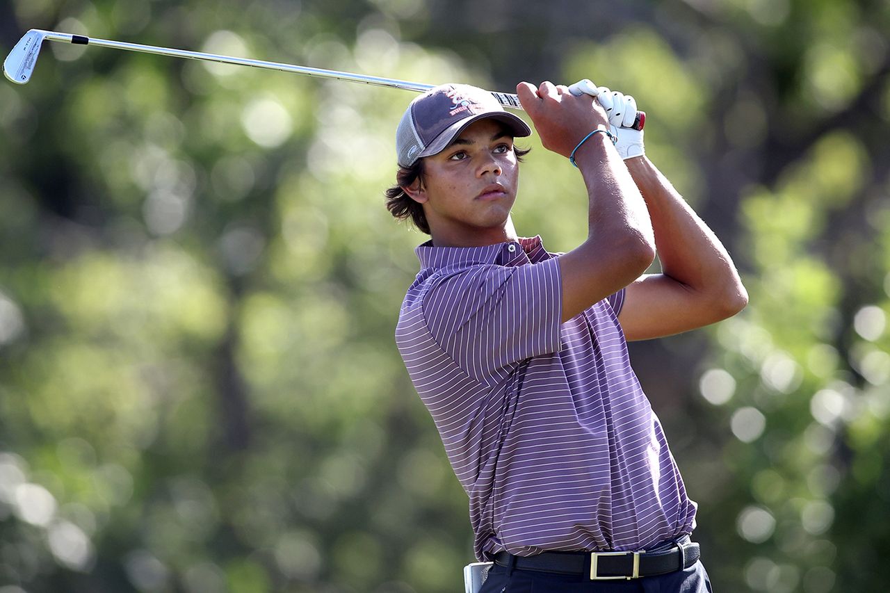 Charlie Woods hits a tee shot on the fourth hole during the first round of the U.S. Junior Amateur at Brook Hollow Golf Club on July 21, 2025 in Dallas, Texas.Credit: Tim Heitman/Getty