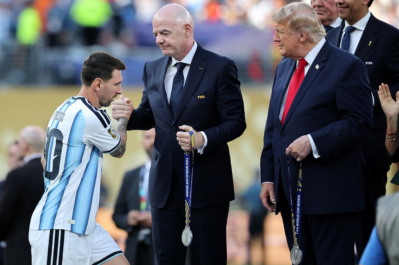 Lionel Messi #10 of Argentina receives his runner-up medal from U.S. President Donald Trump after the FIFA World Cup 2026 Final match between Spain and Argentina at New York New Jersey Stadium on July 19, 2026 in East Rutherford, New Jersey. Lionel Messi receives his runners-up medal from FIFA president Gianni Infantino.