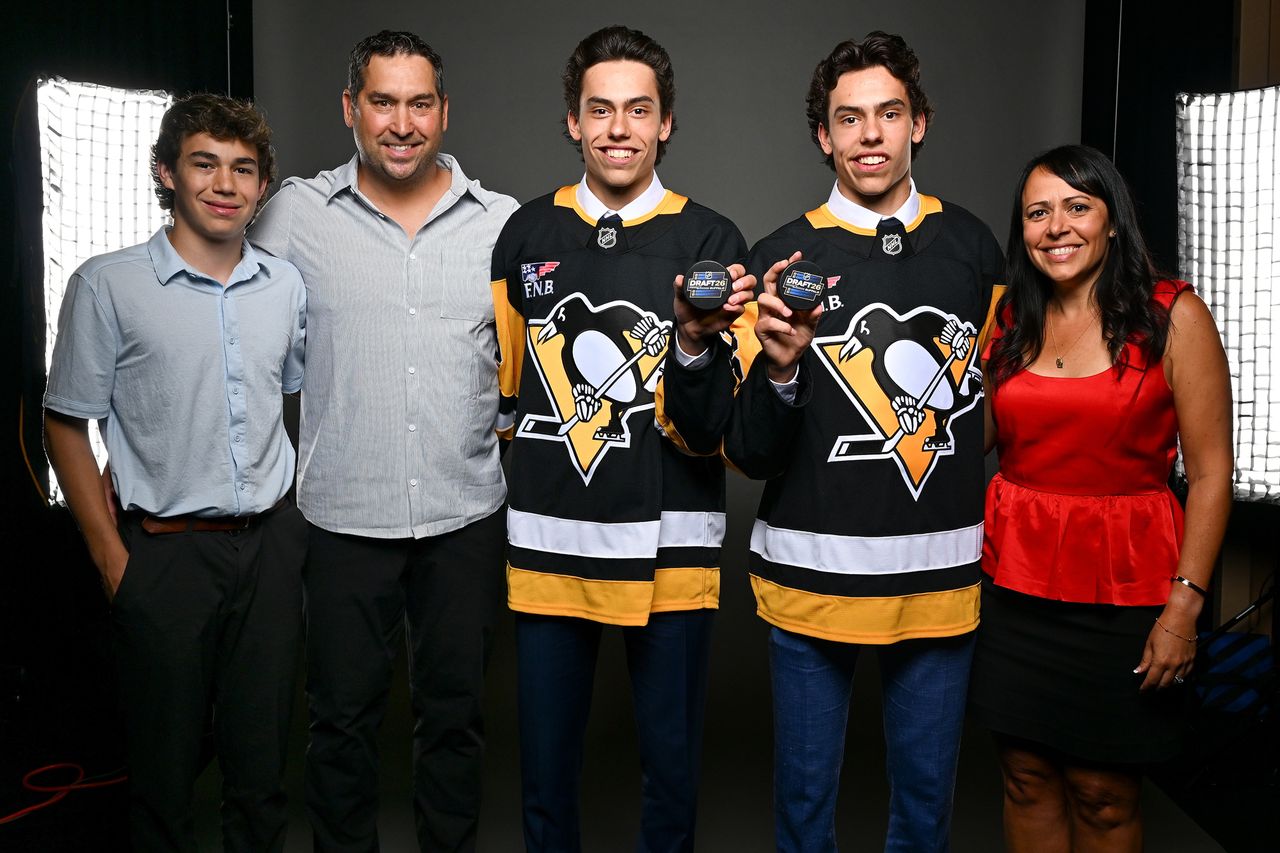 Markus and Liam Ruck celebrate with their family after being selected by the Pittsburgh Penguins in the 2026 NHL DraftCredit: Joe Hrycych/Getty