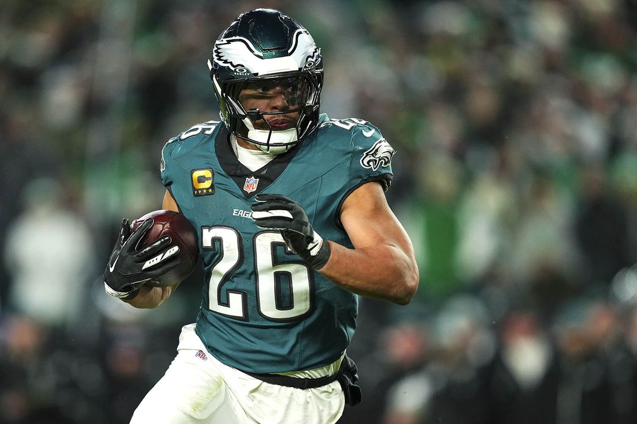 Saquon Barkley #26 of the Philadelphia Eagles runs the ball during an NFL wild card playoff football game against the San Francisco 49ers at Lincoln Financial Field on January 11, 2026 in Philadelphia, Pennsylvania. Saquon Barkley #26 of the Philadelphia EaglesCredit: Cooper Neill/Getty