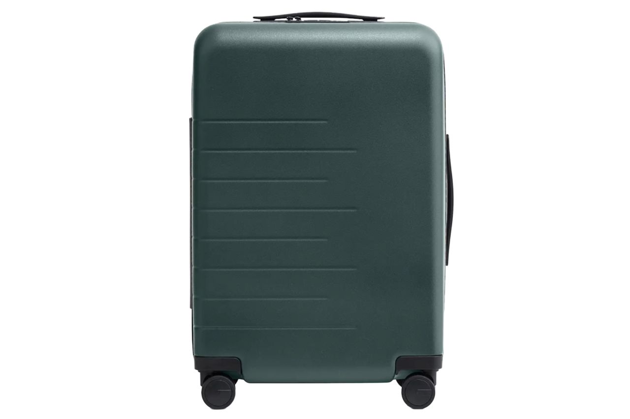 Carry-On Suitcase in Dark Green Credit: Quince