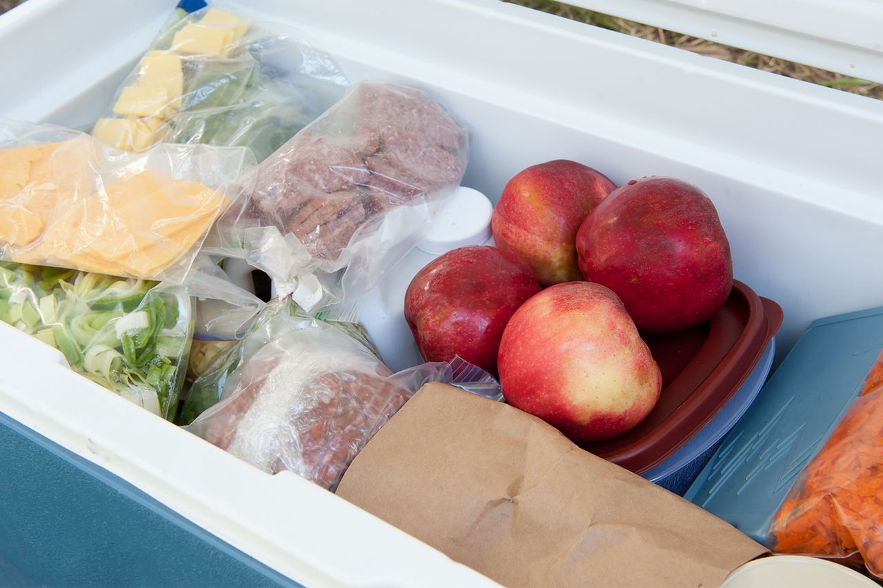 Cooler filled with meat, cheese, fruits and vegetables.Credit: Getty