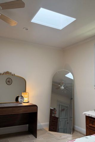 College Student Asked for More Sunlight in Her Bedroom, Then Her Dad Started Cutting Into the Ceiling Jhoanna Martinez’s new skylight built by her fatherCredit: Jhoanna Martinez