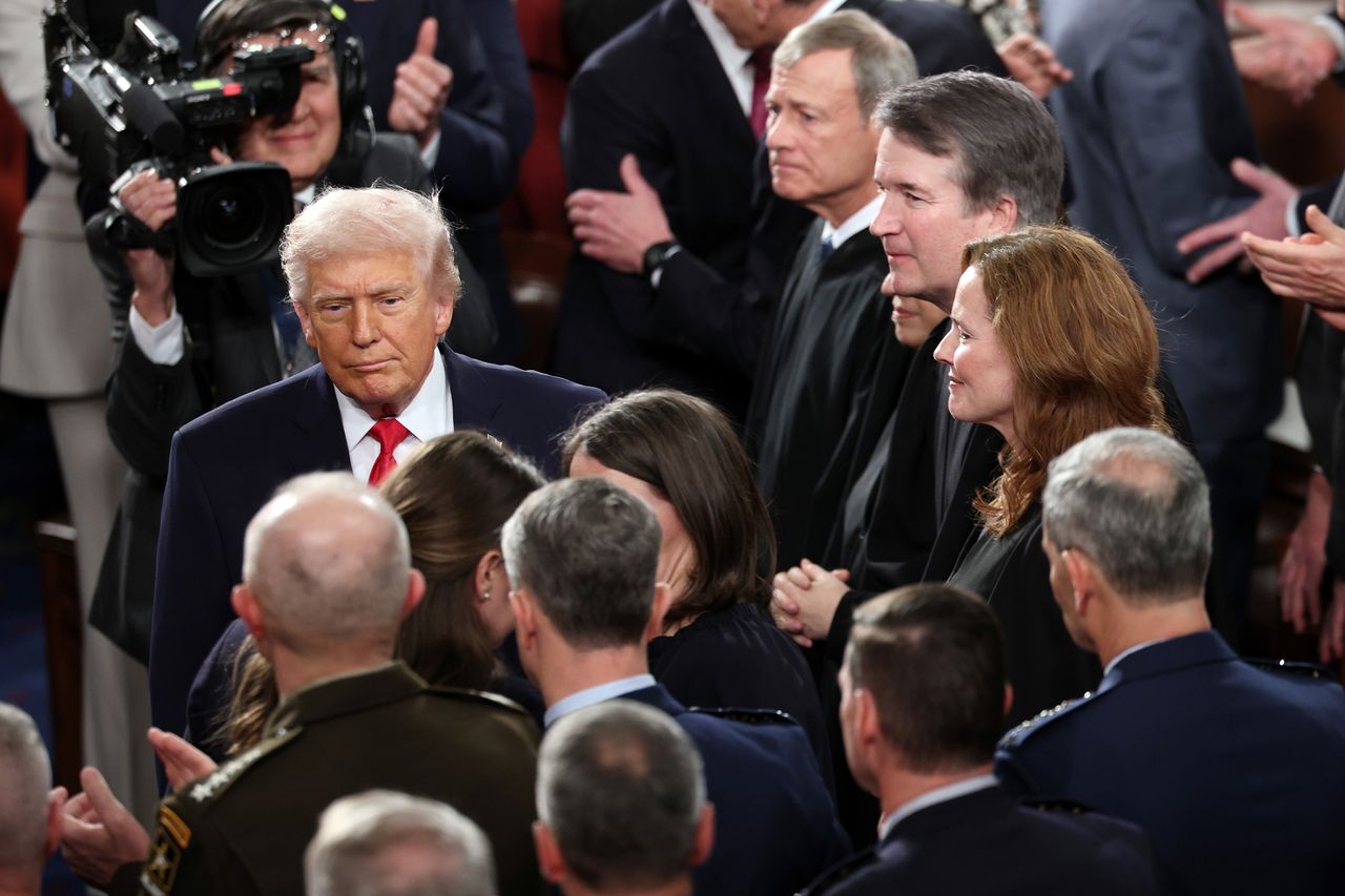 President Donald Trump walks past Supreme Court Chief Justice John Roberts, Associate Justice Elena Kagan, Associate Justice Brett Kavanaugh and Associate Justice Amy Coney Barrett as he arrives for the State of the Union on Feb. 24.Credit: Win McNamee/Getty