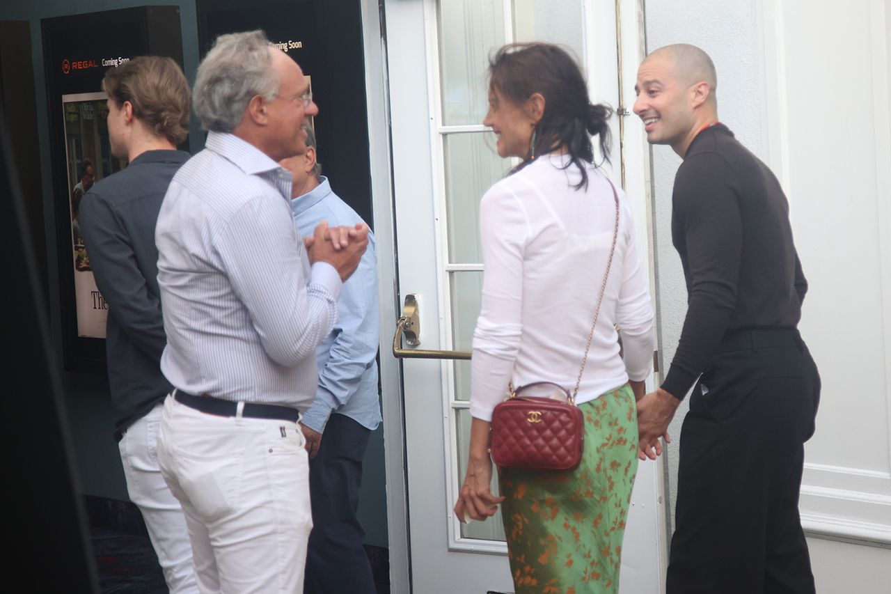Katie Holmes holding hands with artist Jason Bard Yarmosky as they are spotted arriving for The Hamptons premiere of 'The Invite' Credit: Matt Agudo/INSTARimages