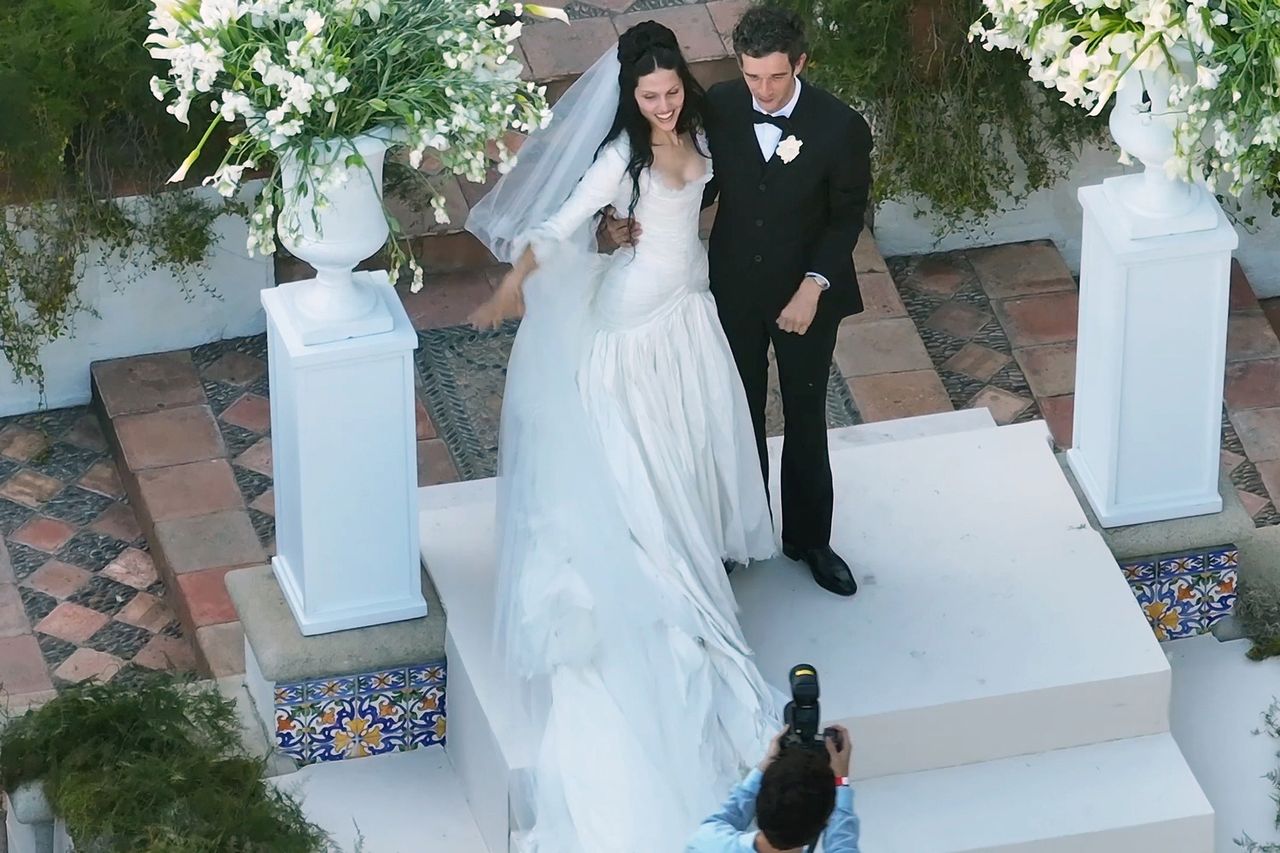 Matty Healy dips and kisses his bride Gabbriette as they tie the knot at a romantic sunset wedding beneath the Hollywood sign Gabbriette and Matt HealyCredit: BACKGRID