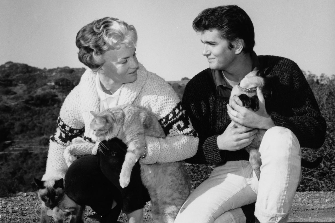 Michael Landon at home with his wife Dodie and their cats, circa 1960.Credit: Archive Photos/Getty