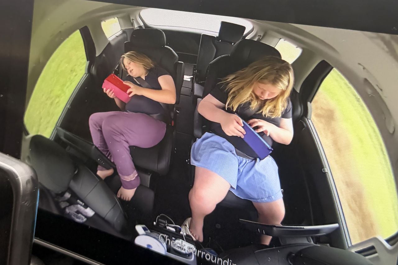 Haven’s two daughters accompany her on a DoorDash delivery run.Credit: Courtesy of Haven Broady