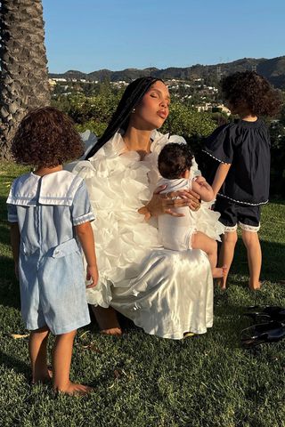 Nara Smith poses for a photo with her three kids.Credit: Nara Smith/ Instagram
