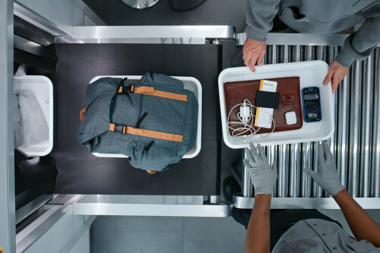 TSA Airport Security Checkpoint A security officer completes a passenger screening.Credit: Getty