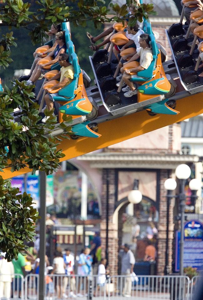 A stock photo of roller coaster riders at Six Flags Over GeorgiaCredit: Allen Sullivan/AJC via ZUMA Press Wire/Shutterstock