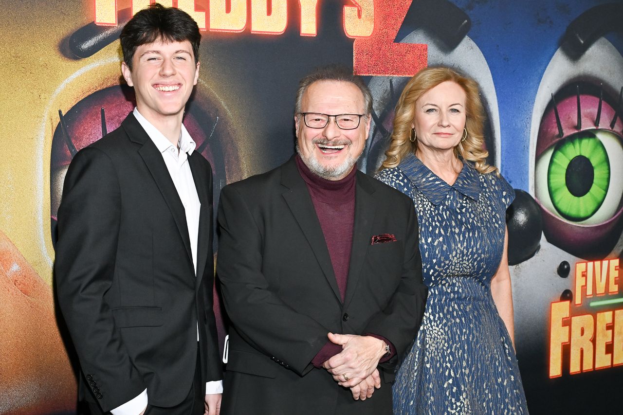 Wayne Knight with two others at a promotional event for a movie From left: Liam Knight, Wayne Knight and Clare Knight attend the Universal Pictures’ premiere of ‘Five Nights at Freddy’s 2’ at TCL Chinese Theatre in L.A. on Dec. 2, 2025Credit: Michael Buckner/Getty