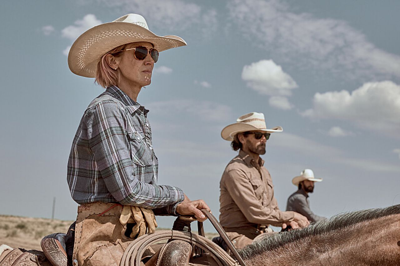 Three individuals on horseback wearing cowboy hats set in an open landscape under a cloudy sky Jen Landon and Ian Bohen in ‘Yellowstone’ season 5Credit: Paramount