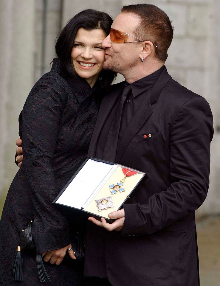 DUBLIN - IRELAND - MARCH 29: Bono, birth name Paul Hewson, poses with his wife Ali Hewson after receiving a Knighthood from Ambassador David Reddaway awarded to him by Her Majesty the Queen in recognition of his services to the music industry and his humanitarian work, at the British Ambassador's residence on March 29, 2007 in Dublin, Ireland. (Photo by ShowBizIreland/Getty Images) Ali Hewson and Bono in 2007Credit: ShowBizIreland/Getty