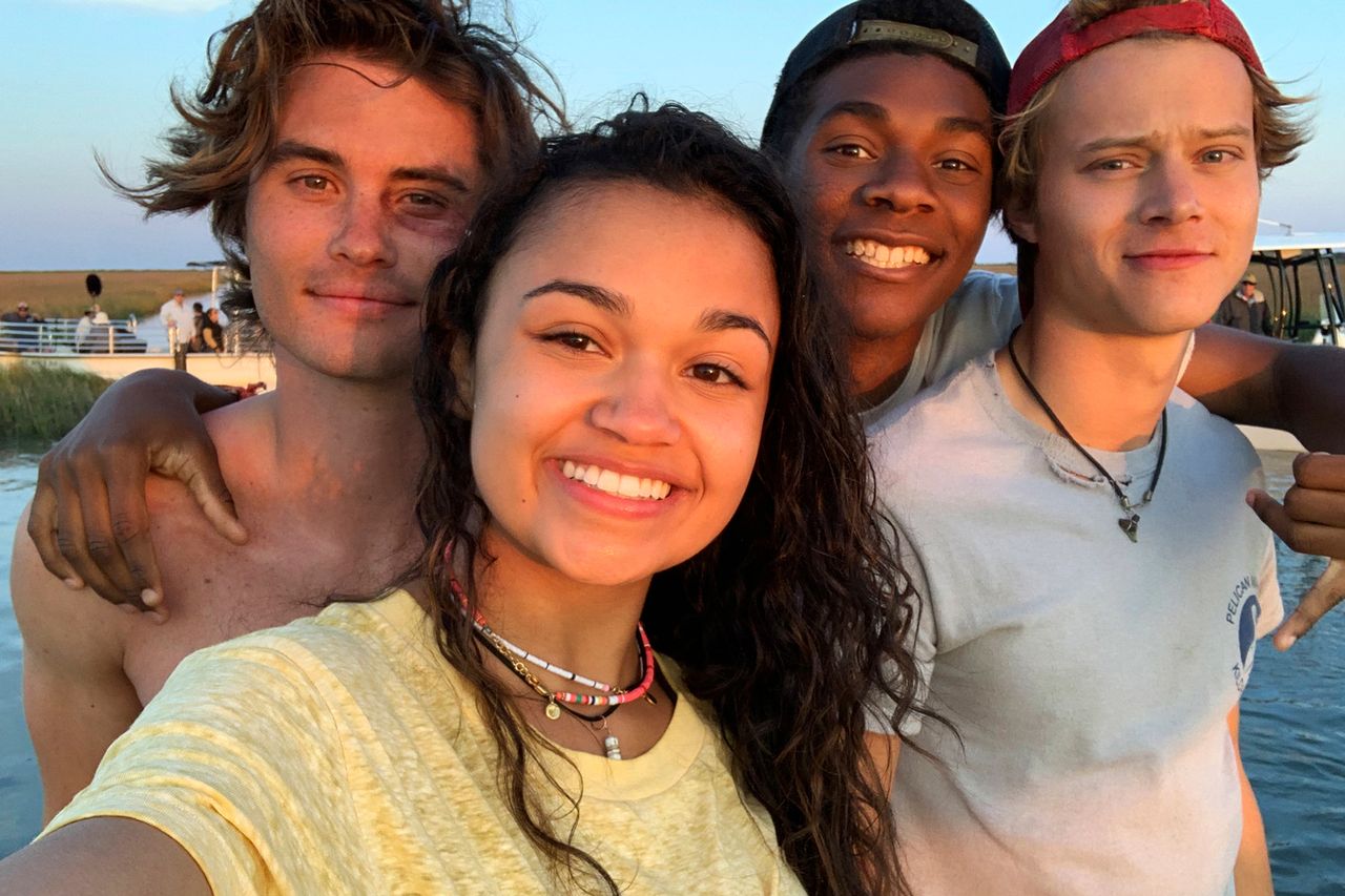 (L-R) Chase Stokes, Madison Bailey, Jonathan Daviss, and Rudy Pankow behind-the-scenes on ‘Outer Banks’Credit: JACKSON LEE DAVIS/NETFLIX© 2021