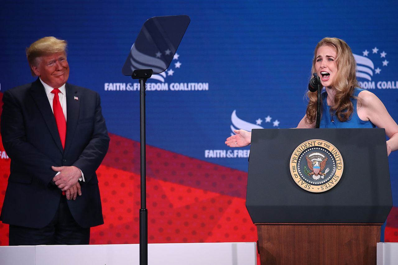 Natalie Harp speaks on stage next to President Donald Trump during the Faith & Freedom Coalition’s 2019 conference in Washington, D.C.Credit: Mark Wilson/Getty