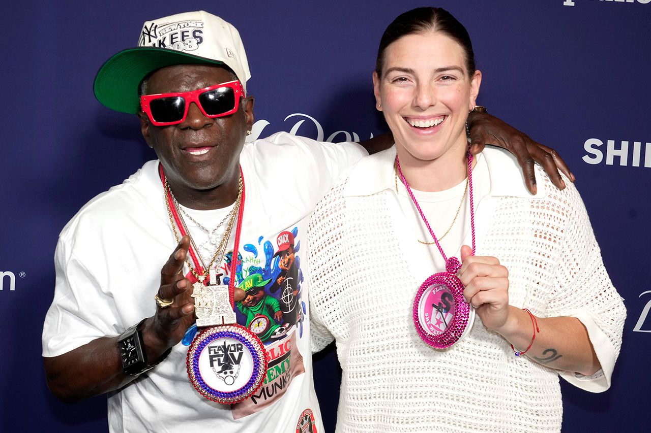Flavor Flav (left) and Hilary Knight (right) during the musician’s SHE Weekend in July 2026.Credit: Jeff Kravitz/FilmMagic