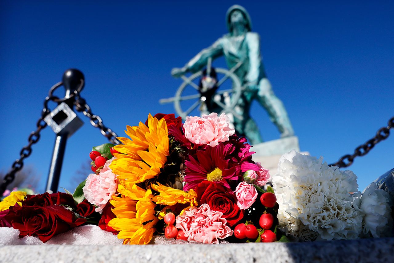 Flowers rest at the Gloucester Fisherman’s Memorial on January 31, 2026Credit: Craig F. Walker/The Boston Globe via Getty