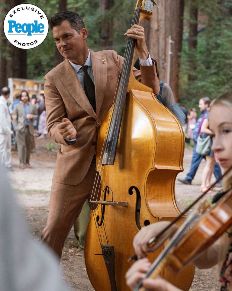 Singer Molly Tuttle Marries Old Crow Medicine Show’s Ketch Secor in Whimsical Forest Wedding Ketch Secor performs during his wedding to Molly TuttleCredit: Danforth Neal