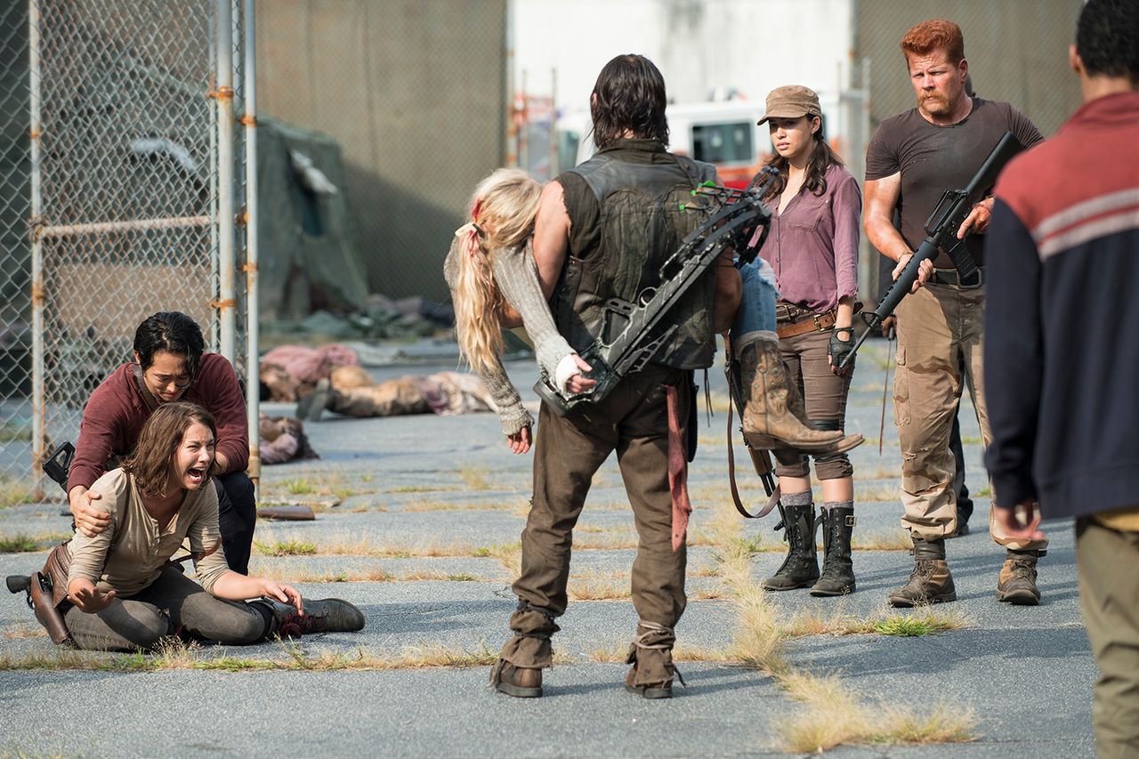 Glenn (Steven Yeun) and Maggie (Lauren Cohan) react to Beth’s death (center, with Norman Reedus) on season 5 of ‘TWD.’Credit: Gene Page/AMC