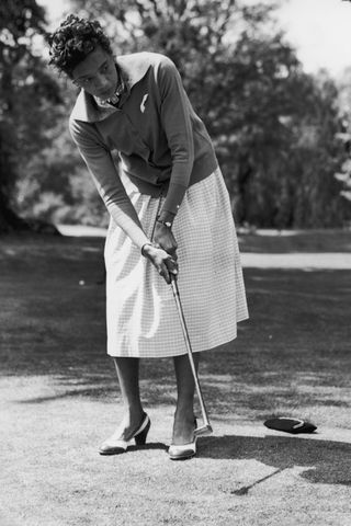 Althea Gibson enjoys a round of golf.Credit: Ron Burton/Keystone/Hulton Archive/Getty
