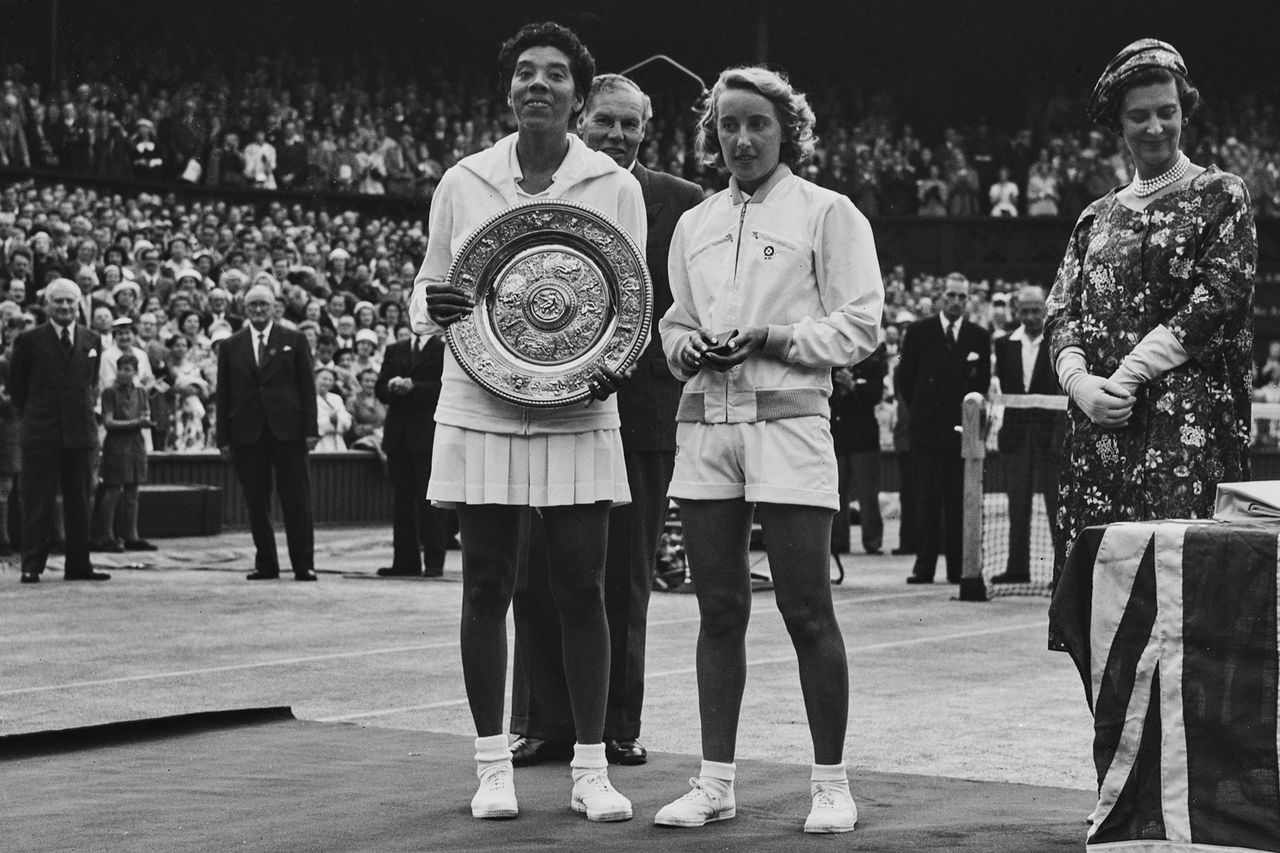 Althea Gibson holding the Venus Rosewater Plate after winning the women’s singles final at the 1958 Wimbledon Tennis ChampionshipsCredit: Evening Standard/Hulton Archive/Getty