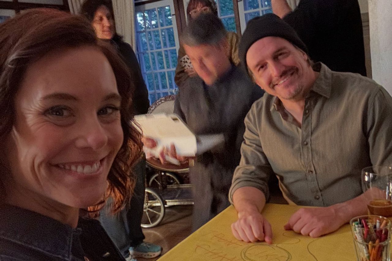 Ashley Williams and her husband Neal Dodson behind the scenes of the tablecloth scene in ‘Much About Love’Credit: Ashley Williams/Instagram