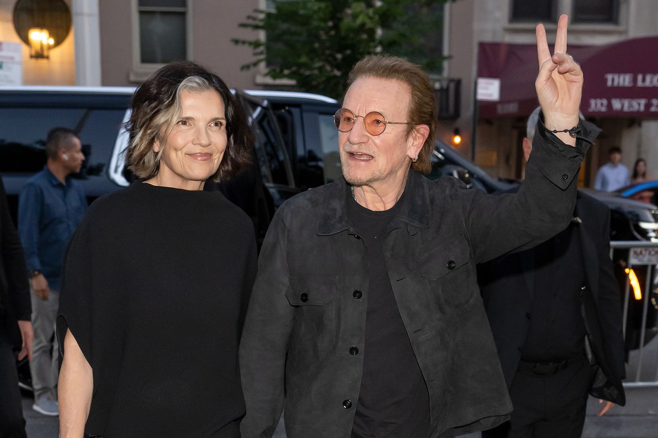 Bono and Ali Hewson outdoors Bono making a peace gesture Ali Hewson and Bono in 2026Credit: Gilbert Carrasquillo/GC Images