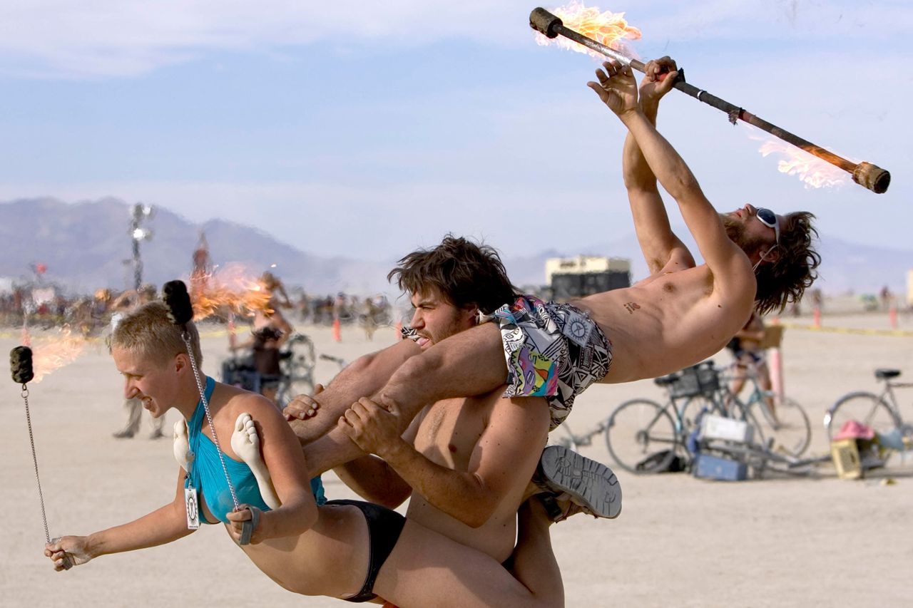 Kelly Peach, Lebn Schuyler and Jules McEvoy practice for a fire performance during the 2006 Burning Man Festival. Kelly Peach, Lebn Schuyler and Jules McEvoy practice for a fire performance during the 2006 Burning Man Festival.Credit: Carlos Avila Gonzalez/The San Francisco Chronicle via Getty
