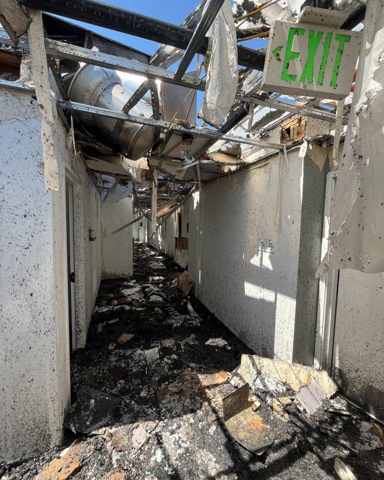 Toast Malone was found alive inside a closet beneath one of the only sections of roof left standing after much of the building collapsedCredit: Unified Fire Authority