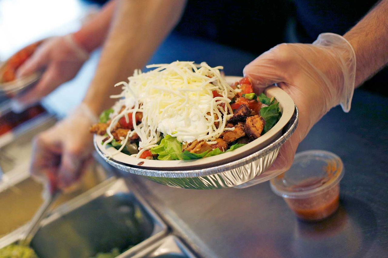 Fans can get BOGO Chipotle entrées on select Sundays throughout the rest of the summerCredit: Luke Sharrett/Bloomberg via Getty