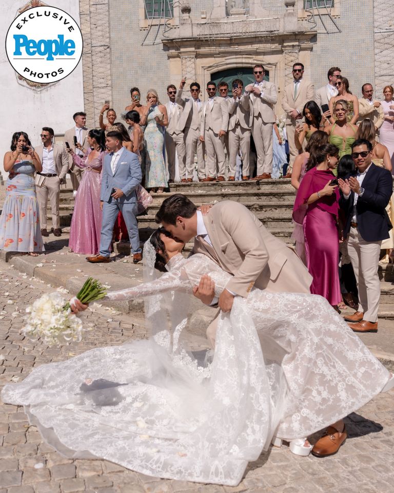 Frank Catania Jr. and bride Nicole at their wedding Frank Catania Jr. and Nicole Perricho with their wedding party and guestsCredit: Michael Zennaro Photography