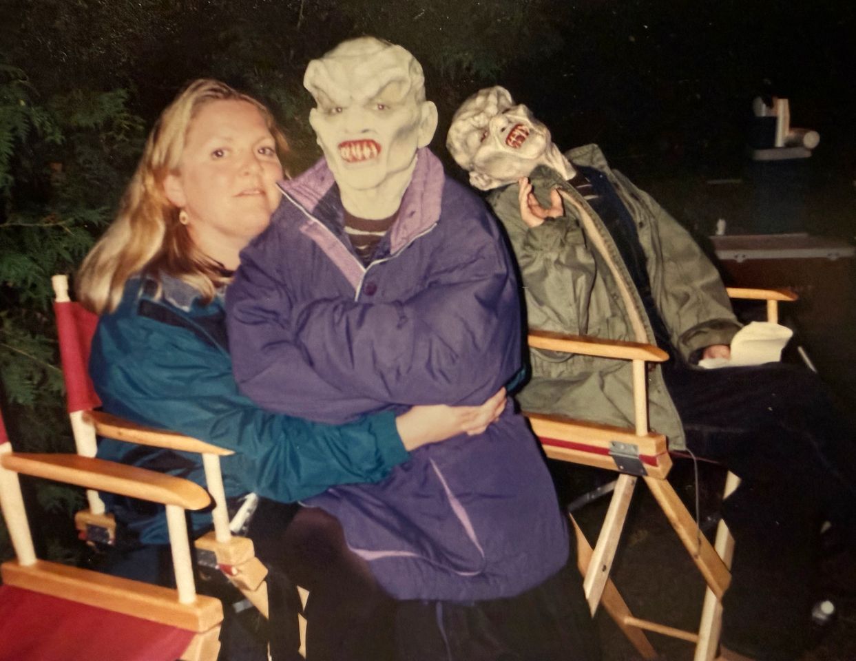 Kathryn poses with the head of wardrobe and her body double between scenesCredit: Courtesy of Kathryn Long
